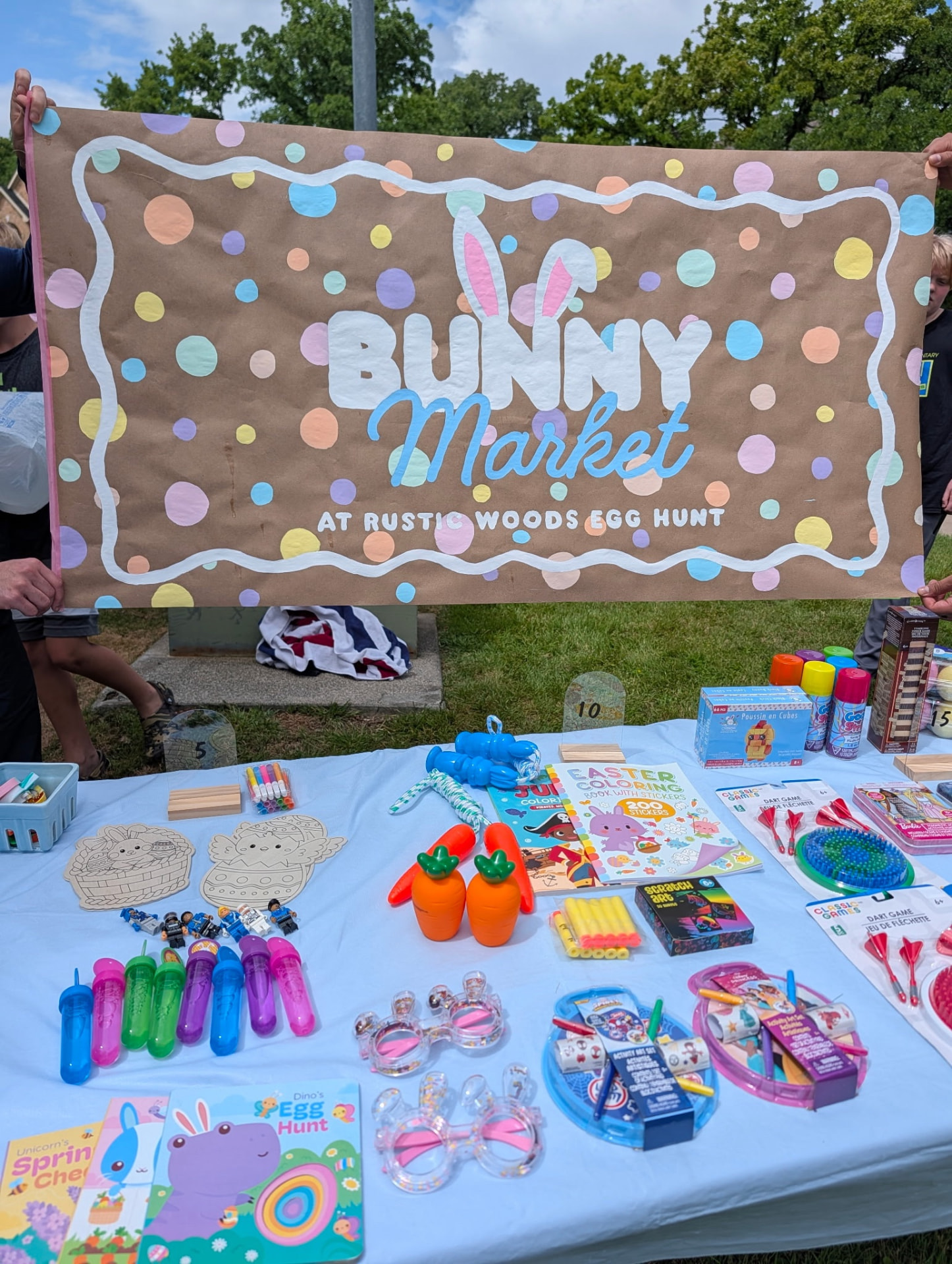 Hand-painted Bunny Market banner at the Rustic Woods Easter egg hunt